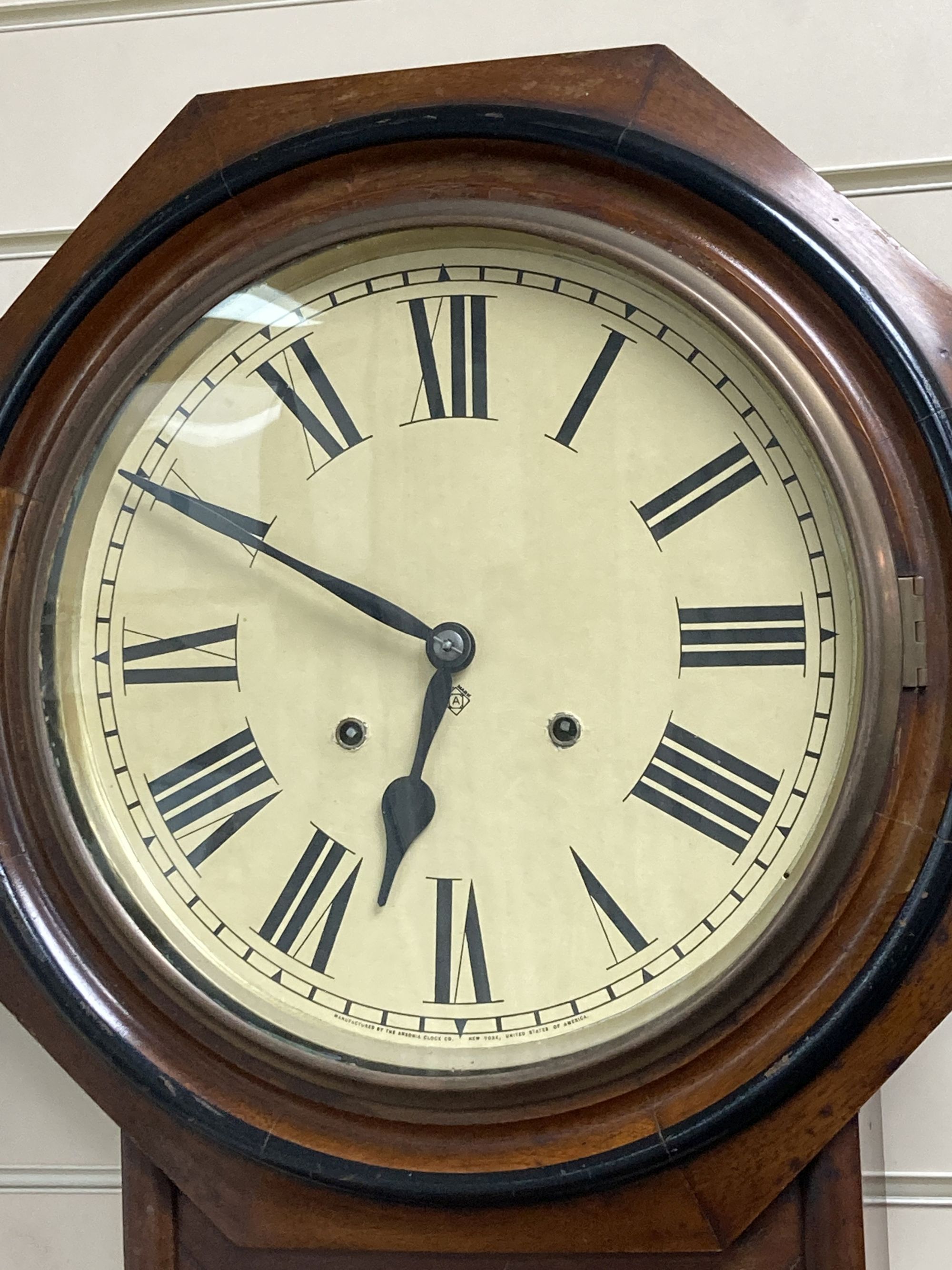 A 19th century American wall clock, height 80cm